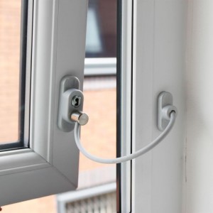 Tethered window restrictor for Child Safety